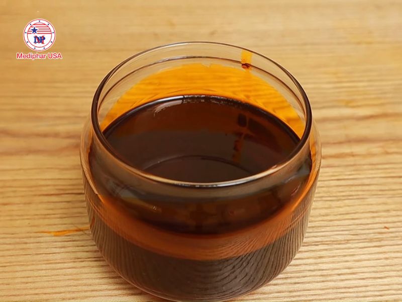 Hướng dẫn cách làm dầu gấc ép lạnh tại nhà Lọc dầu loại bỏ phần cặn